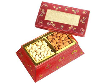 Assorted dry fruits (500 gms) in a rectangular box.; A lovely assortment of dry fruits, namely Kaju / Cashews (250 gms) and Badam / Almonds (250 gms.), that comes to you in a beautiful rectangle gift box.