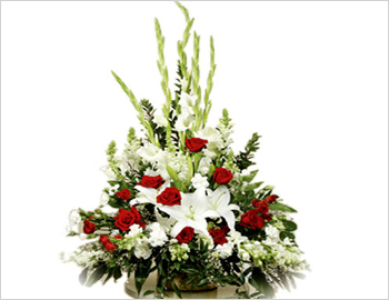 Small Flat Basket of Roses Asters and Glads; A lovely flat arrangement made with a lovely assortment of various hues of roses, asters, gladioli with suitable fillers - an appropriate gift for any occassion.